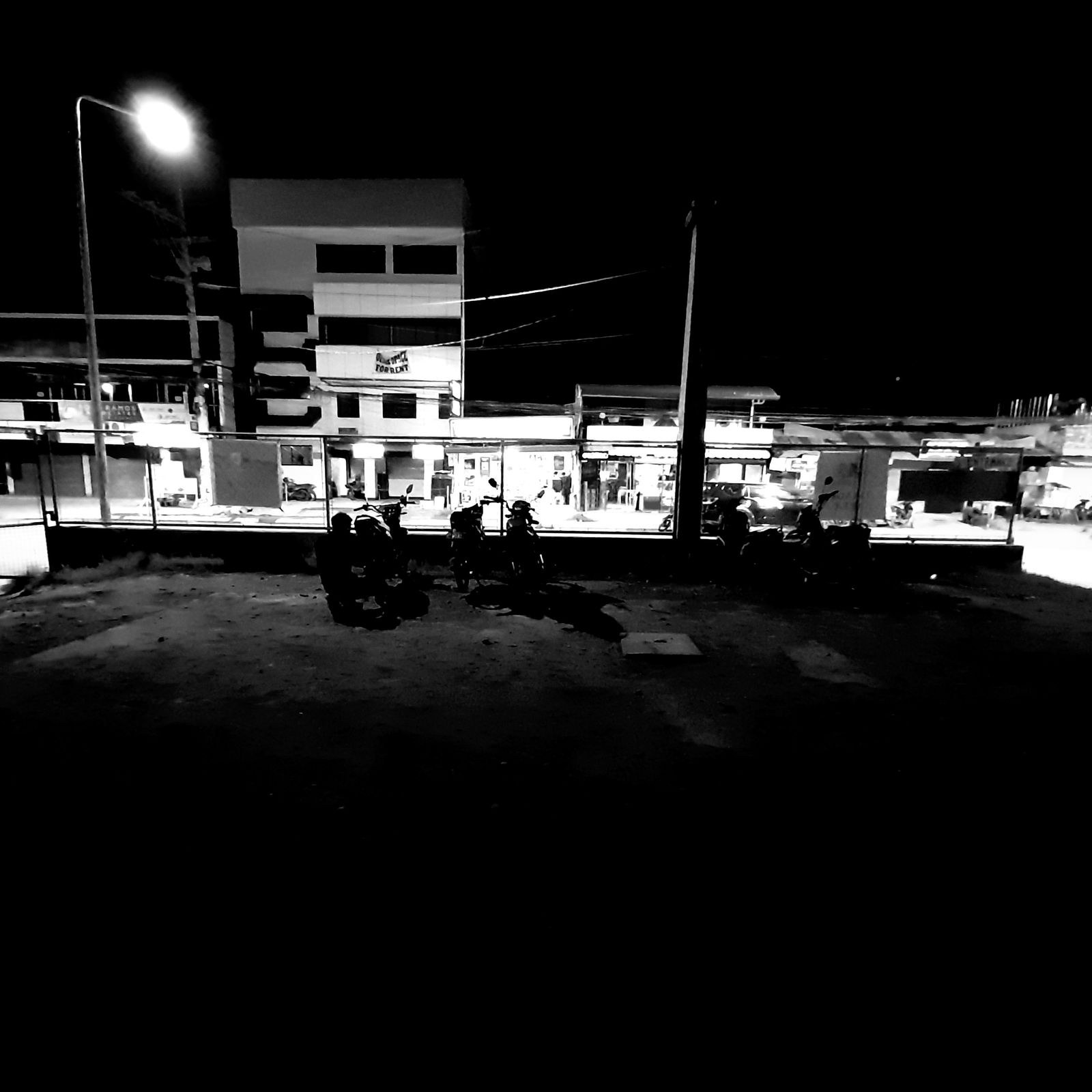 Editor framing a shot with a camera on location